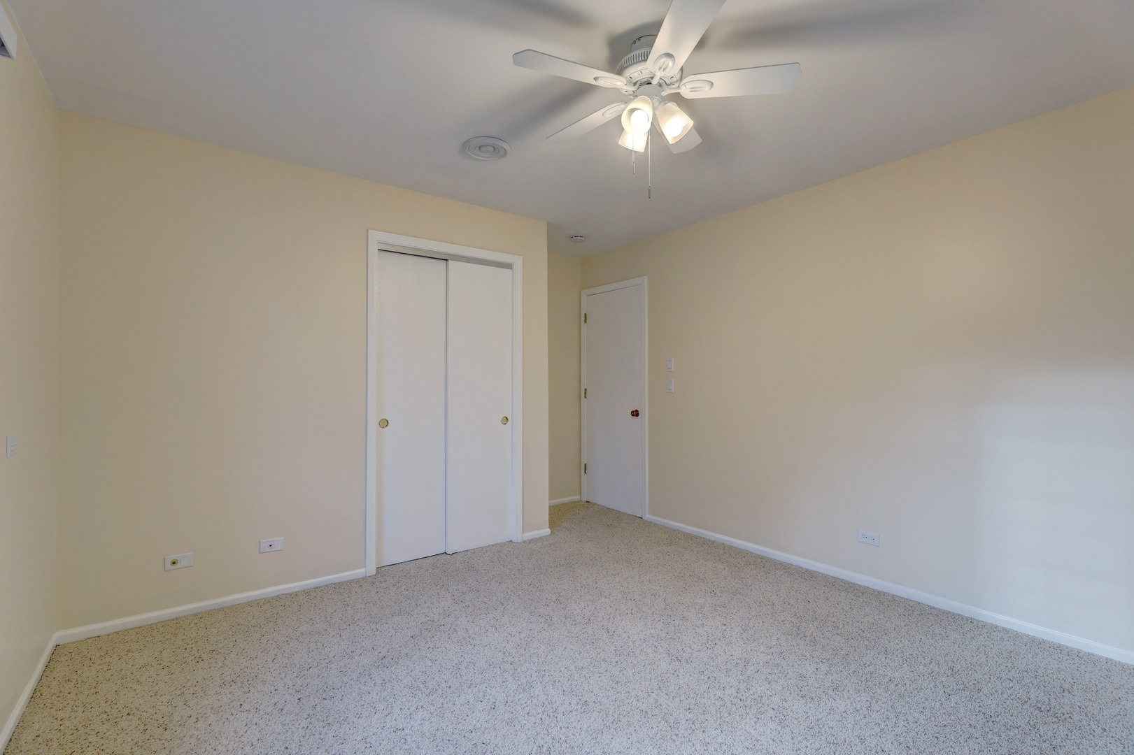 547 Eichler Drive West Dundee, IL 60118 - Photo 13 of 24 an empty room with a ceiling fan and a window