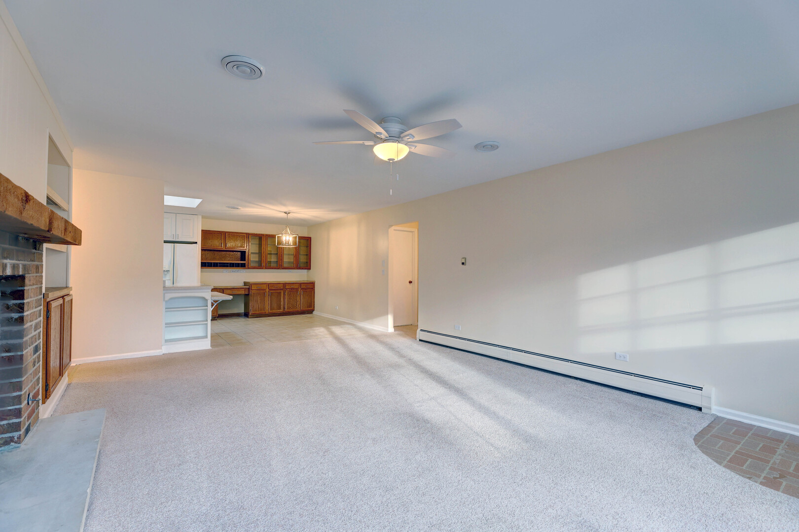 547 Eichler Drive West Dundee, IL 60118 - Photo 5 of 24 a view of a kitchen with a sink and cabinets