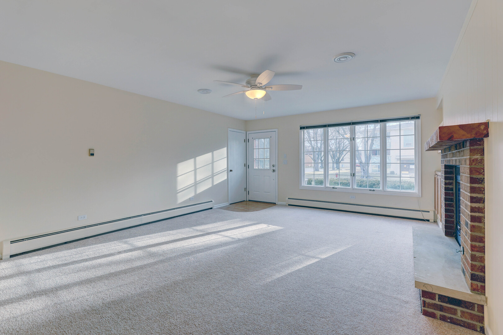 547 Eichler Drive West Dundee, IL 60118 - Photo 6 of 24 a view of an empty room with a window