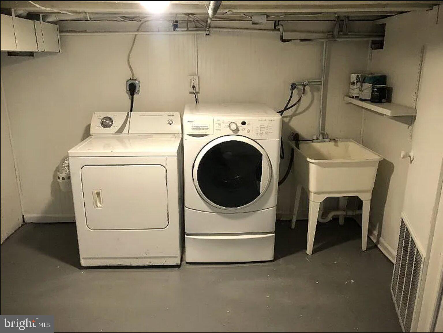 5 Coates Street Bridgeport, PA 19405 - Photo 21 of 28 a utility room with dryer and washer