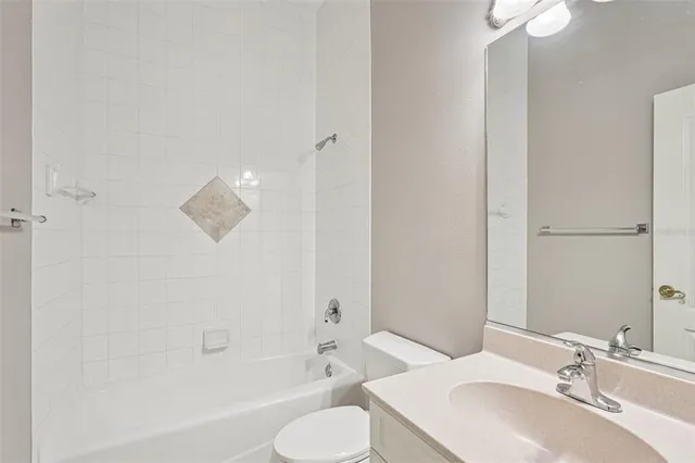 a view of a chairs and table in the balcony