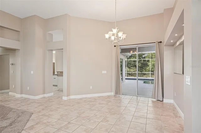 a view of an entryway with a chandelier