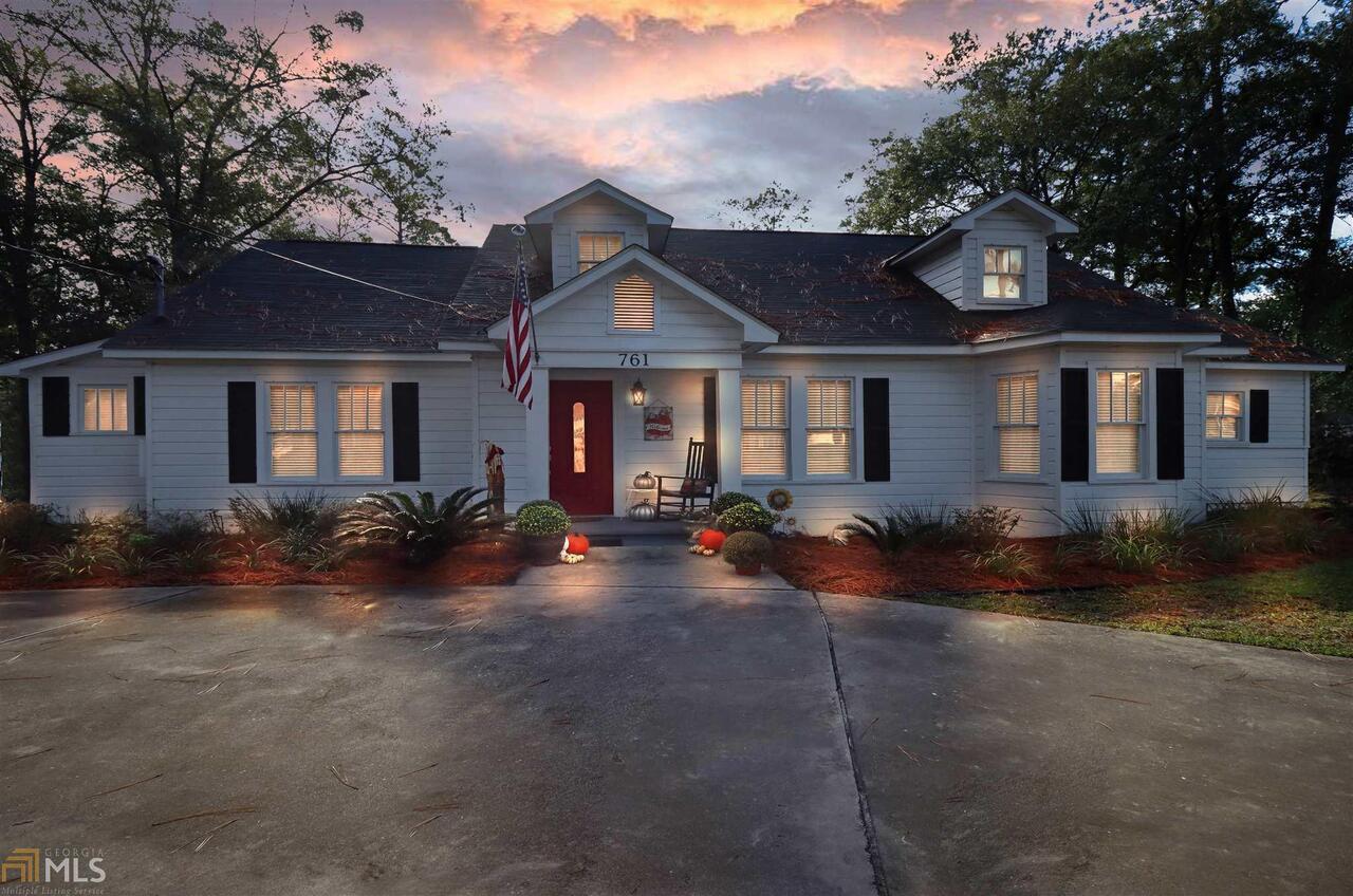 front view of a house with yard