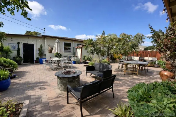 a house view with a outdoor space