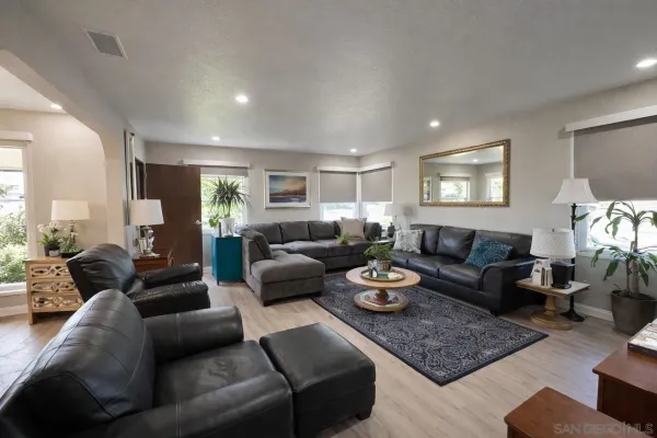 a living room with furniture and a couch