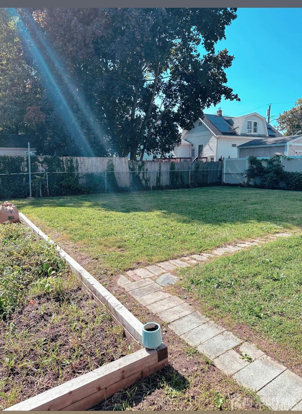 32 Apple Street Edison, NJ 08817 - Photo 3 of 11 a view of a backyard