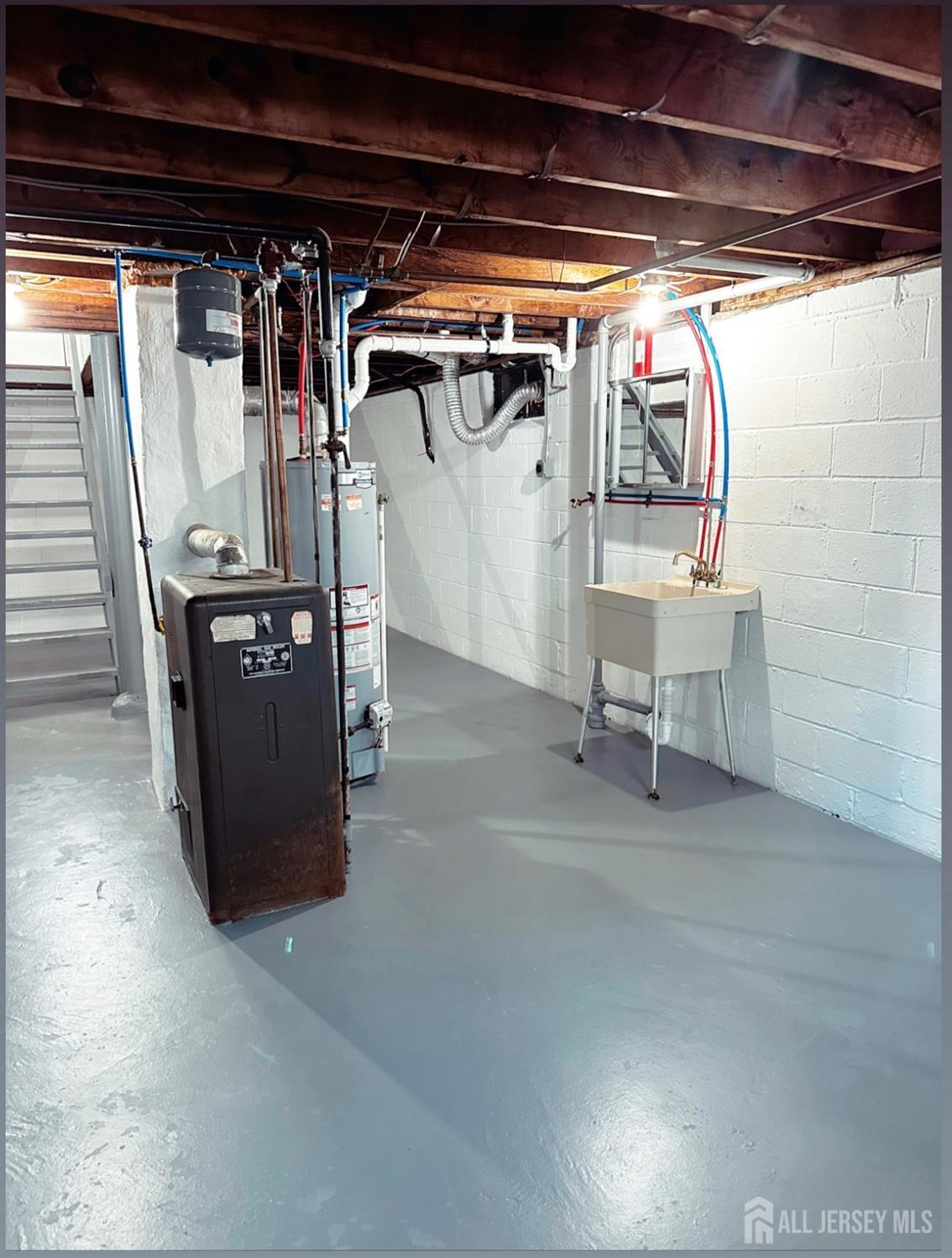 32 Apple Street Edison, NJ 08817 - Photo 9 of 11 a view of a storage room with chairs