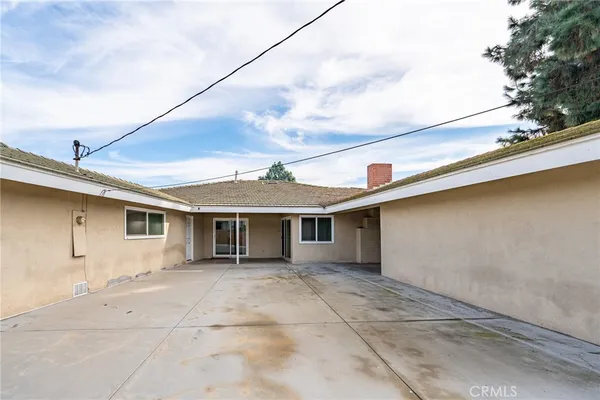 a view of house with garage