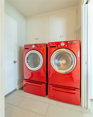 a view of a room with washer and dryer