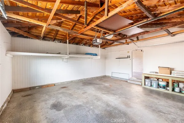 a view of a room with wooden racks