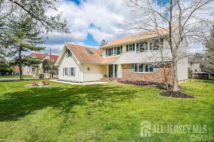 3993 Park Avenue Edison, NJ 08820 - Photo 37 of 37 a front view of a house with a yard