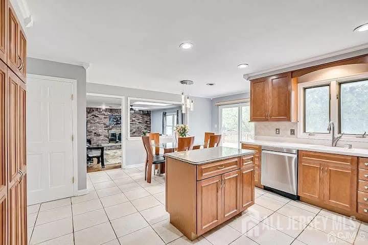 3993 Park Avenue Edison, NJ 08820 - Photo 8 of 37 a kitchen that has a lot of white cabinets and stainless steel appliances