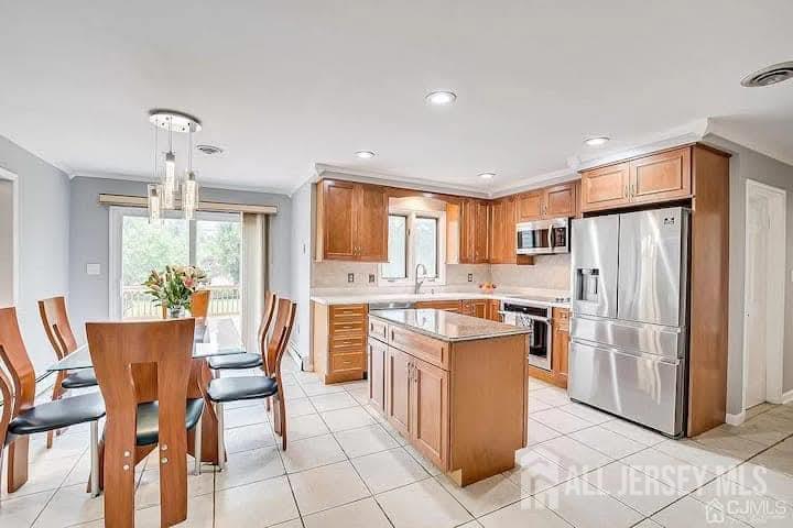 3993 Park Avenue Edison, NJ 08820 - Photo 9 of 37 a kitchen with refrigerator and cabinets