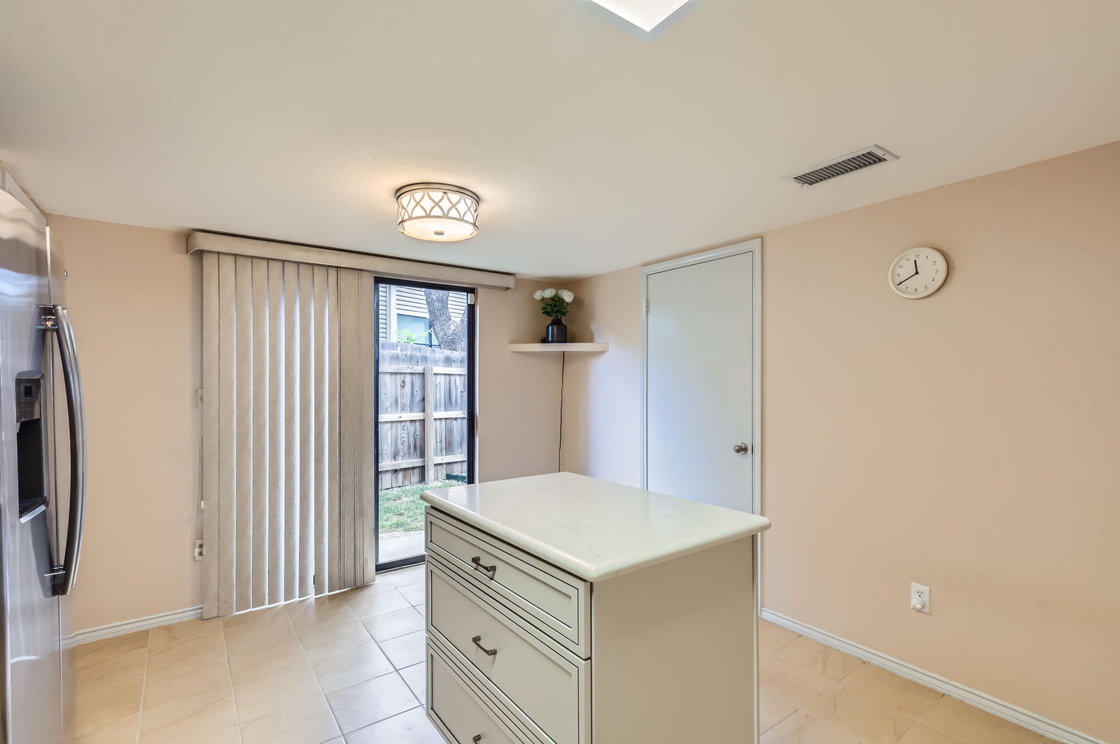 4513 Sidereal Drive Austin, TX 78727 - Photo 15 of 38 Kitchen has pantry and sliding doors that lead to spacious side patio yard.