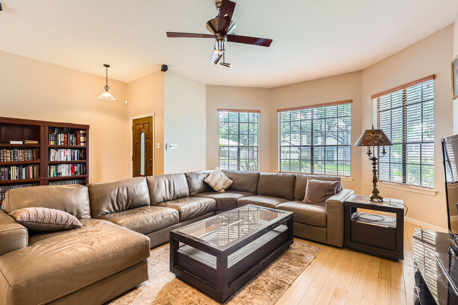 4513 Sidereal Drive Austin, TX 78727 - Photo 7 of 38 Living area with large windows and plenty of light.