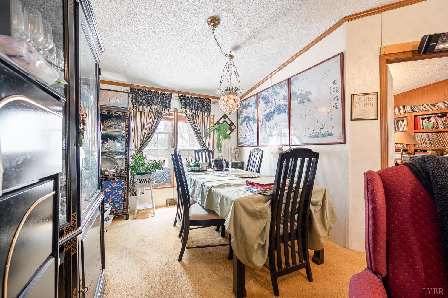 4400 Murray Hollow Road Thaxton, VA 24174 - Photo 15 of 56 a view of a dining room with furniture window and outside view