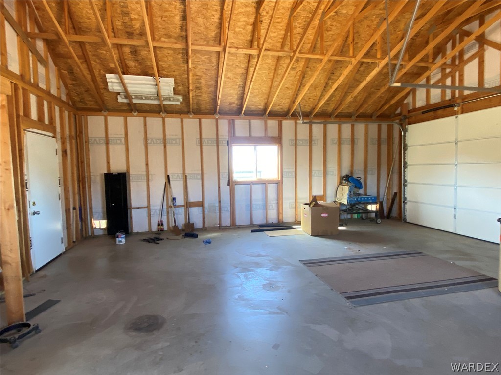 9095 Elliott Ridge Road Kingman, AZ 86401 - Photo 14 of 54 an empty room with windows
