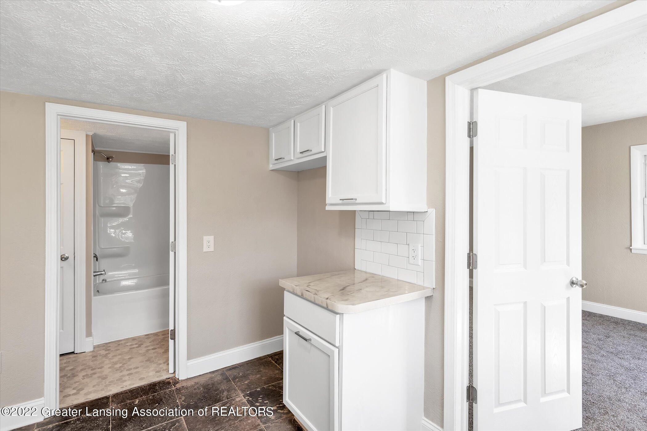 5005 Hughes Road Lansing, MI 48910 - Photo 10 of 29 14-5005-Hughes-Rd-WindowStill-Real-Estat