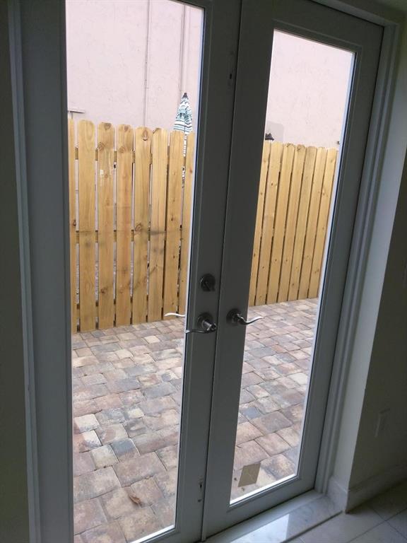 3050 Northeast 5th Terrace, Unit 6 Wilton Manors, FL 33334 - Photo 19 of 22 a view of a door