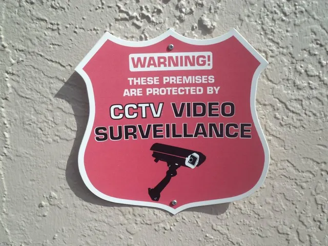 a sign that is on a brick wall