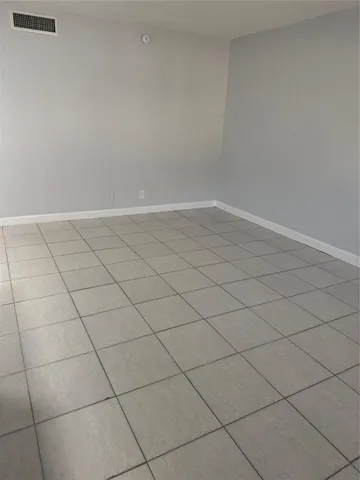 a view of a room and dishwasher