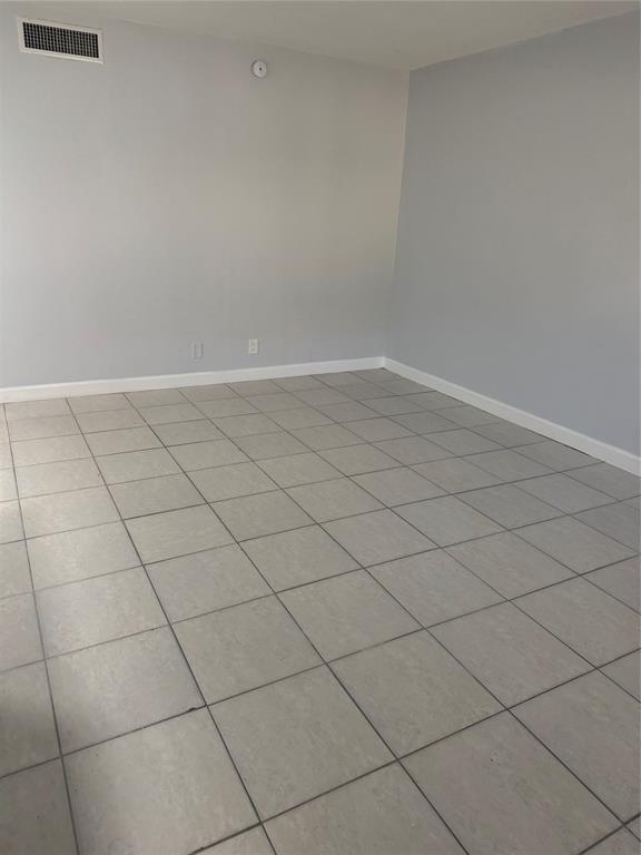 3050 Northeast 5th Terrace, Unit 6 Wilton Manors, FL 33334 - Photo 5 of 22 a view of a room and dishwasher