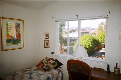 3 Adrian Terrace San Rafael, CA 94903 - Photo 8 of 9 a bedroom with a bed and a window