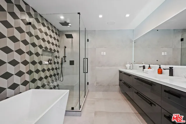 a bathroom with a bathtub and a sink