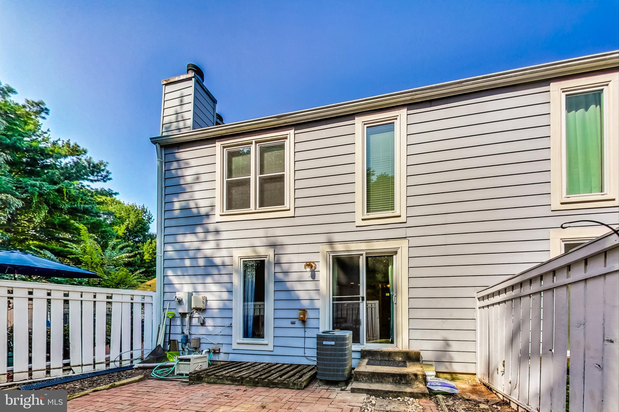 11924 Redtree Way Reston, VA 20194 - Photo 28 of 31 a front view of a house with a yard