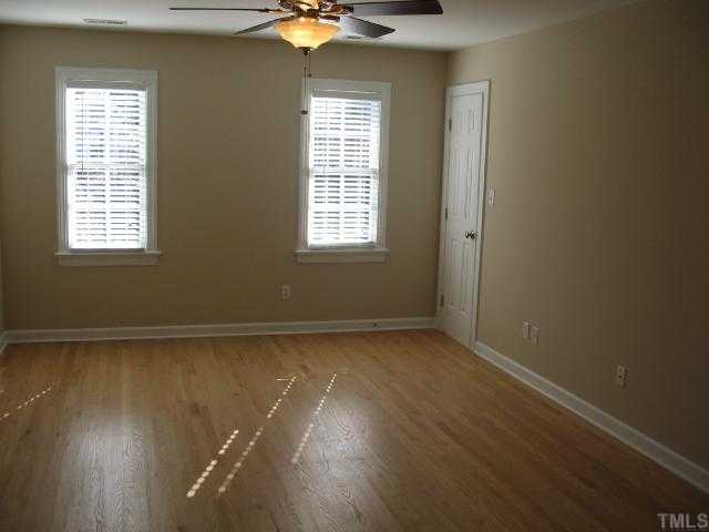 104 Lyncroft Lane Cary, NC 27519 - Photo 8 of 12 Master Bedroom features Hardwoods, Phone, Cable, Fan And HIs and Her Closets!