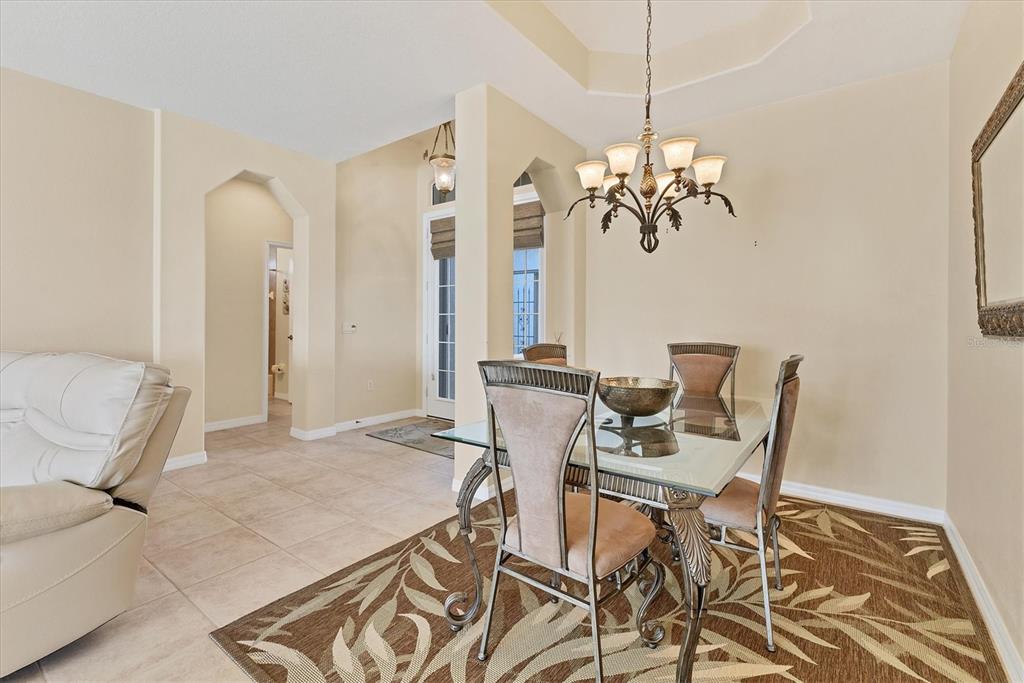 105 Westwind Drive Placida, FL 33946 - Photo 13 of 40 a view of a dining room with furniture