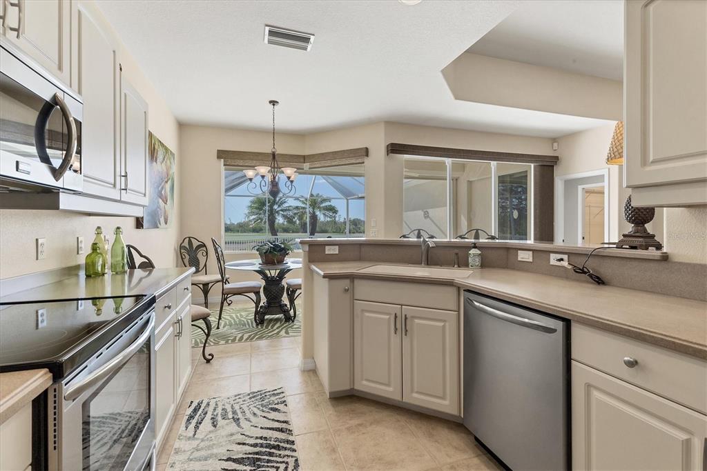 105 Westwind Drive Placida, FL 33946 - Photo 17 of 40 a kitchen with counter top space and sink