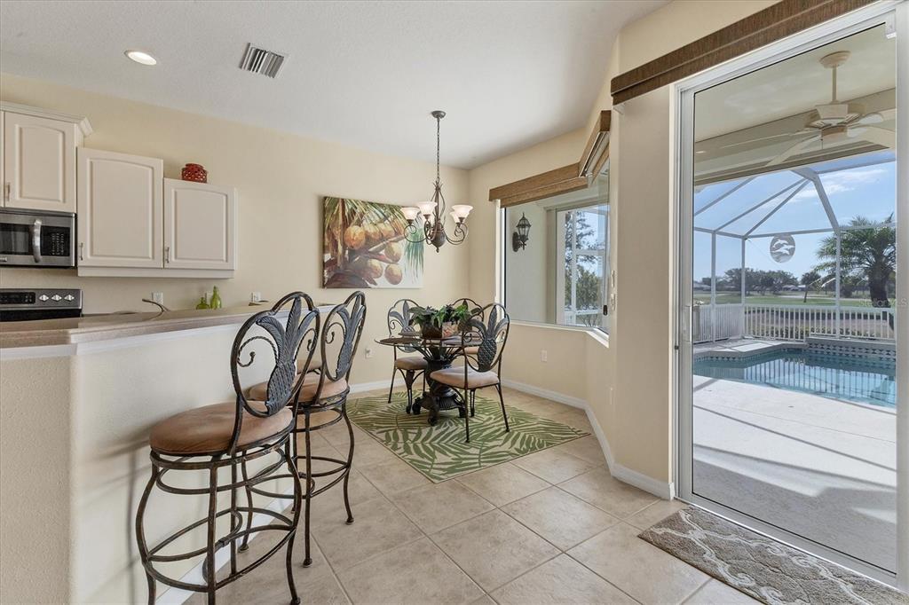 105 Westwind Drive Placida, FL 33946 - Photo 18 of 40 a view of a dining room with furniture window and outside view