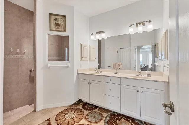 a bedroom with a bed and a desk