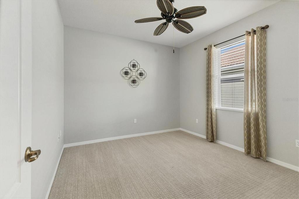 105 Westwind Drive Placida, FL 33946 - Photo 30 of 40 a view of a hallway with a fan