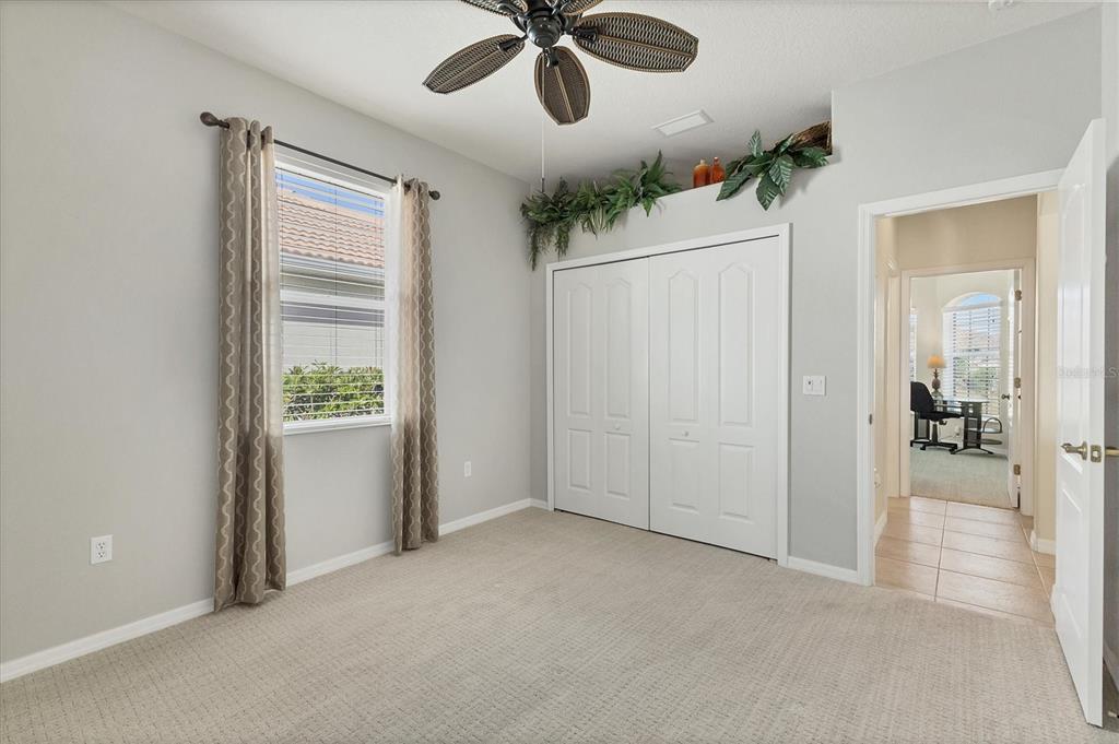 105 Westwind Drive Placida, FL 33946 - Photo 31 of 40 a view of a livingroom with a ceiling fan and window