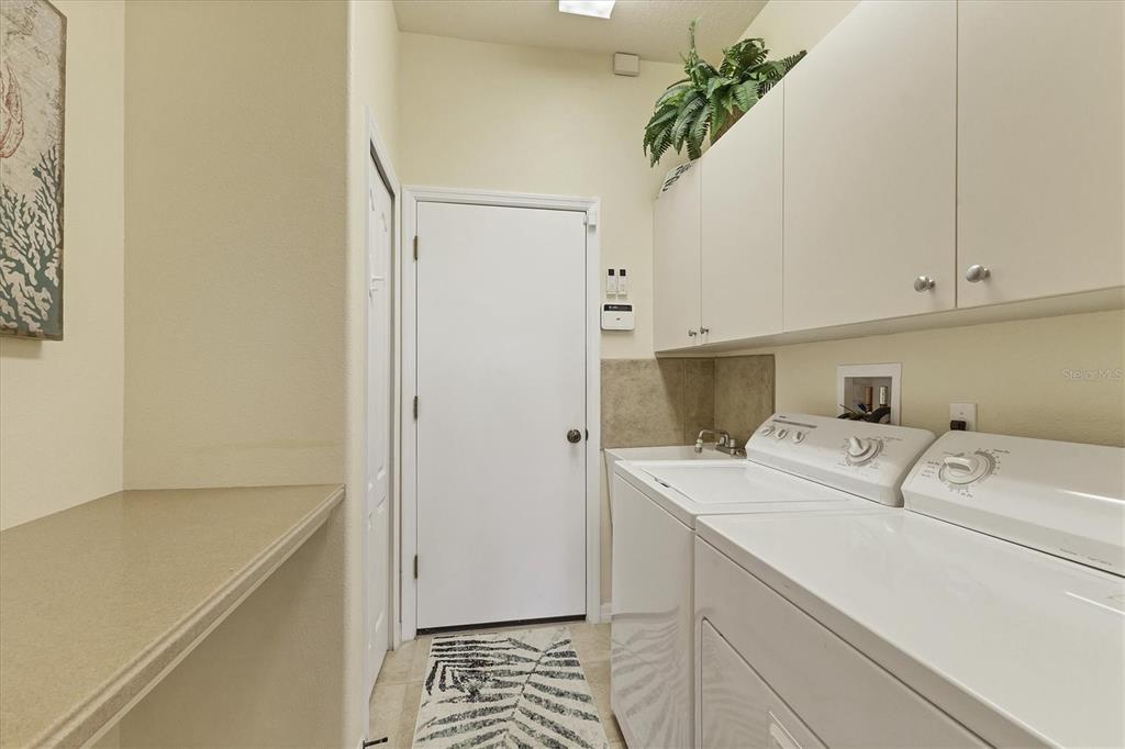105 Westwind Drive Placida, FL 33946 - Photo 32 of 40 a utility room with dryer and washer