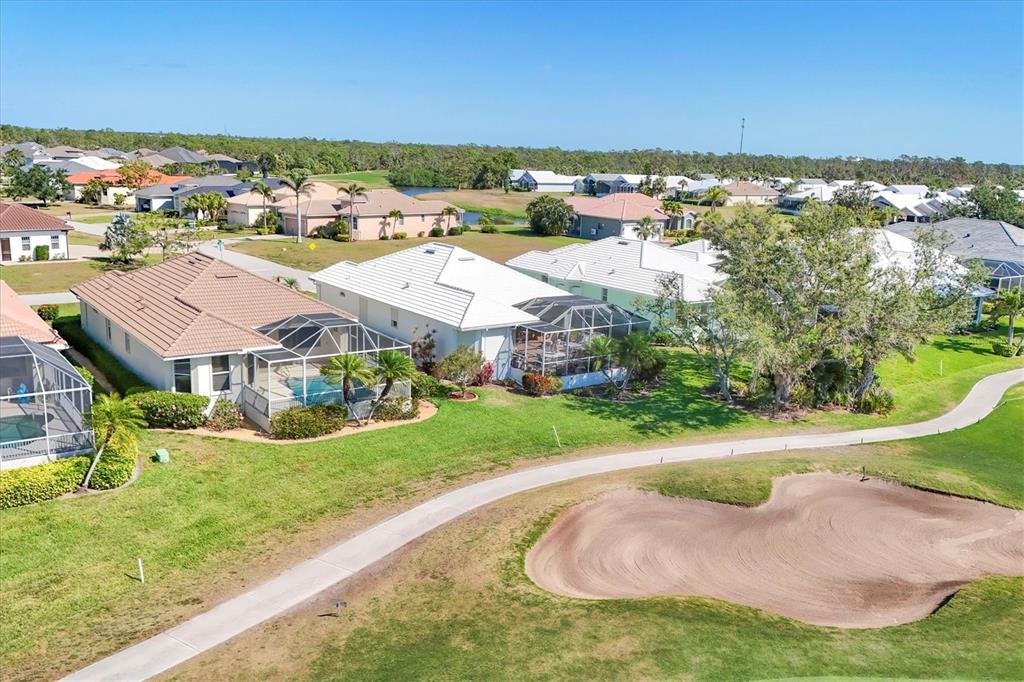 105 Westwind Drive Placida, FL 33946 - Photo 38 of 40 an aerial view of residential houses with yard and lake view