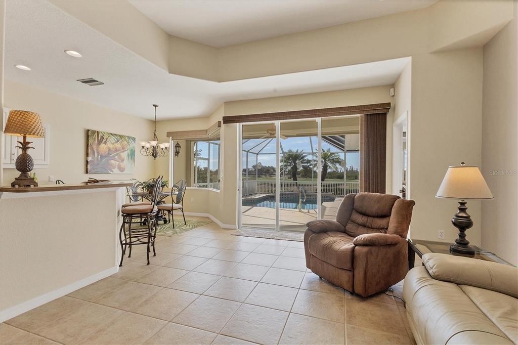 105 Westwind Drive Placida, FL 33946 - Photo 10 of 40 a living room filled with furniture and a large window