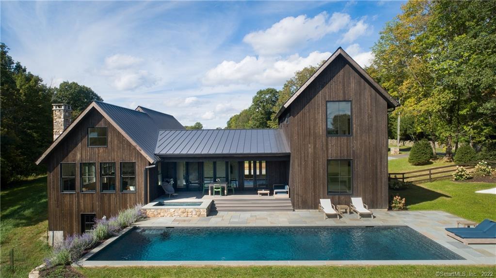 a view of house with yard