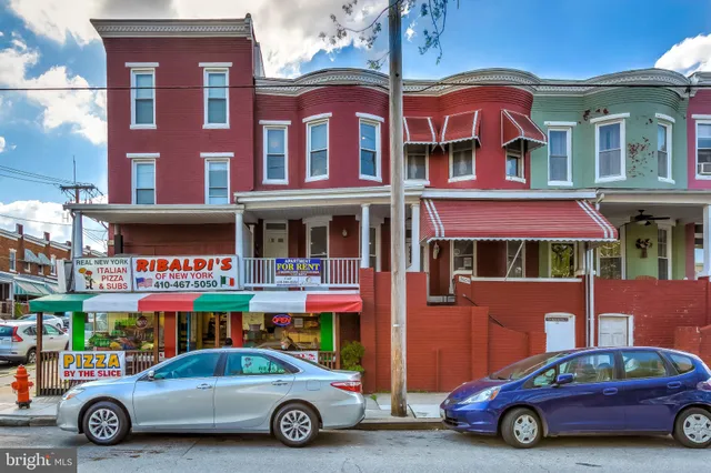 a car parked in front of a building