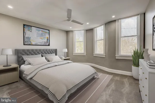 a bathroom with a glass shower door and a toilet