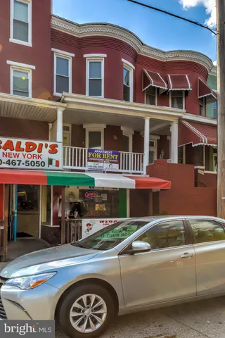 a view of a car park in front of building