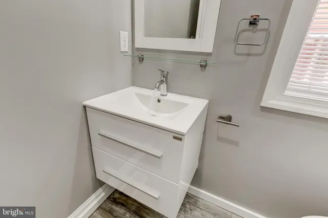 a bathroom with a shower and a toilet