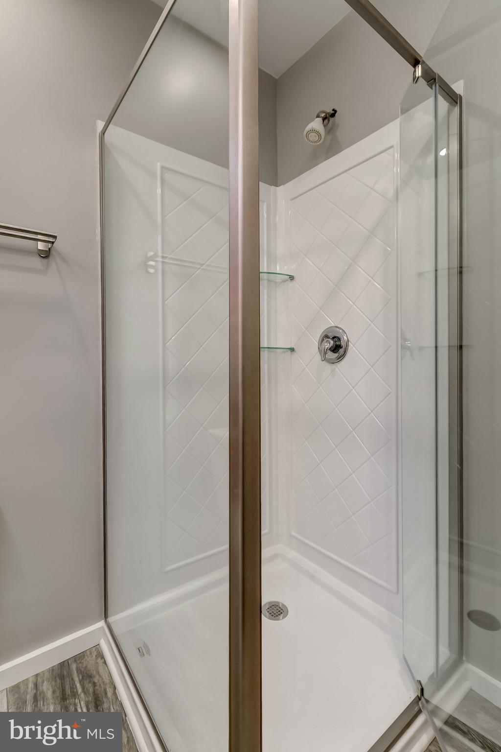 3600 Keswick Road, Unit A Baltimore, MD 21211 - Photo 22 of 43 a bathroom with a shower