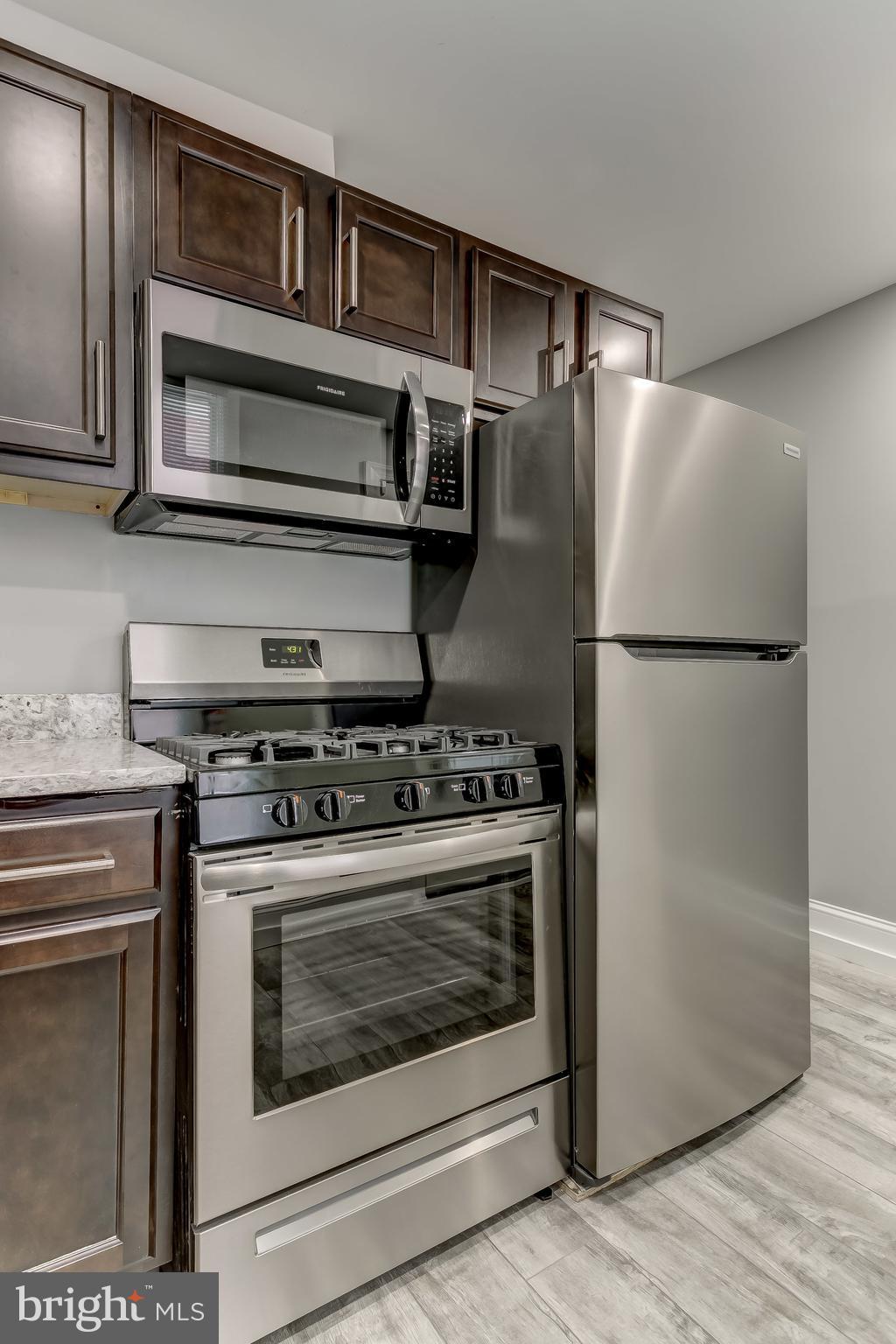 3600 Keswick Road, Unit A Baltimore, MD 21211 - Photo 34 of 43 a stove top oven sitting inside of a kitchen