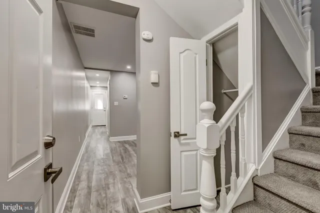 a view of a livingroom from a corridor