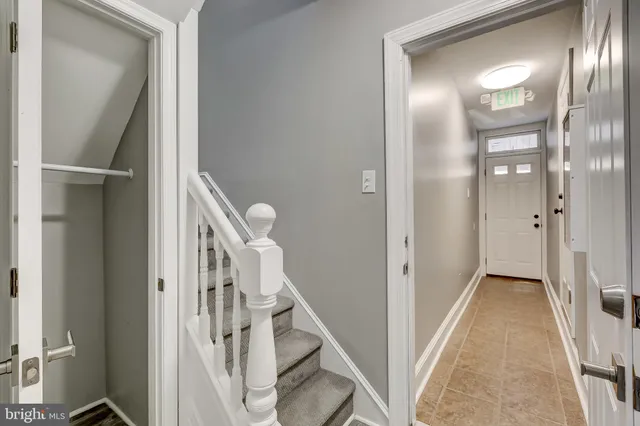 a view of a workspace with furniture
