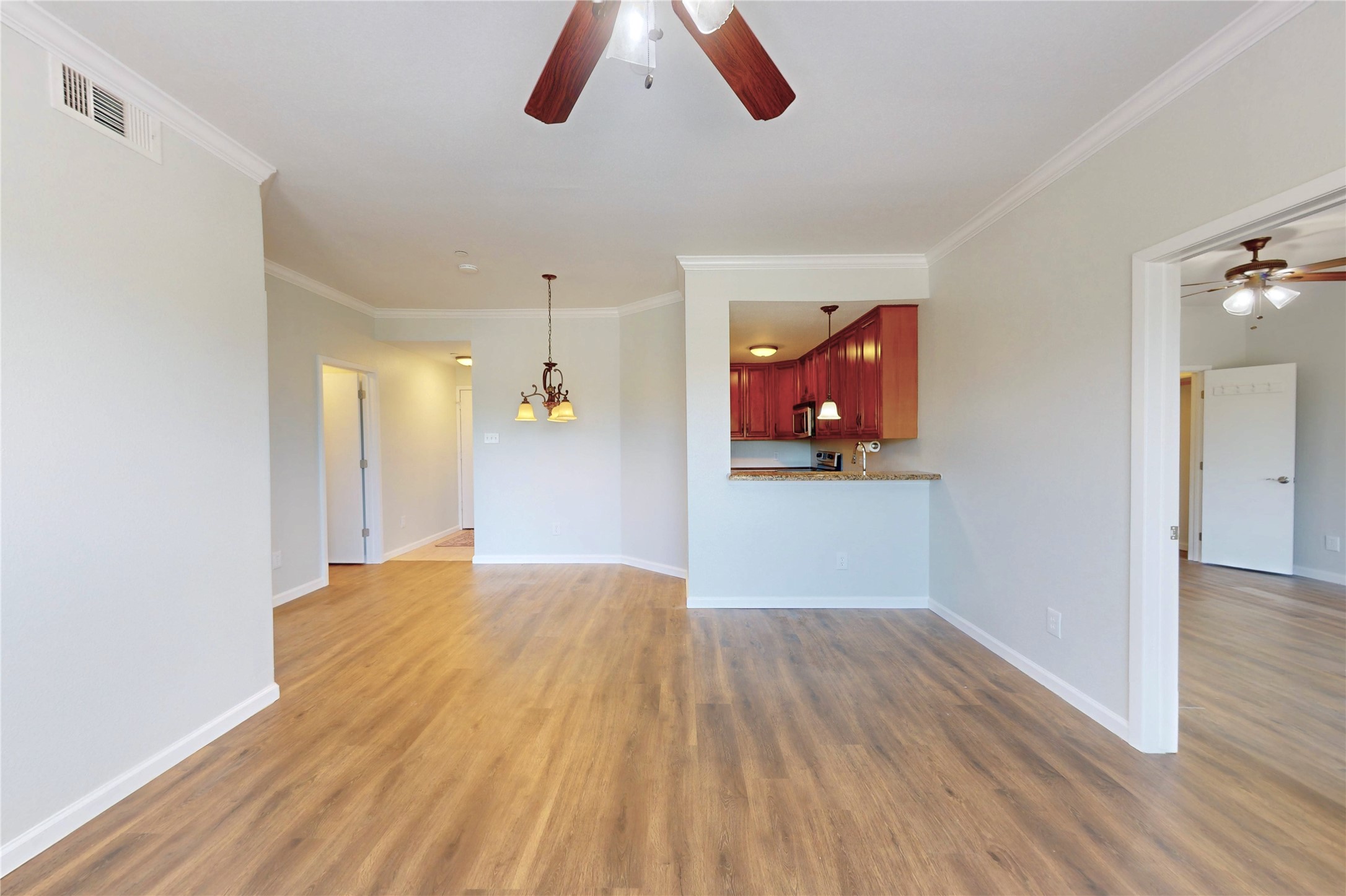 793 Davis Road, Unit 111 League City, TX 77573 - Photo 37 of 37 Living area easily flows from front entrance, dining area to both bedrooms as a split floor plan.