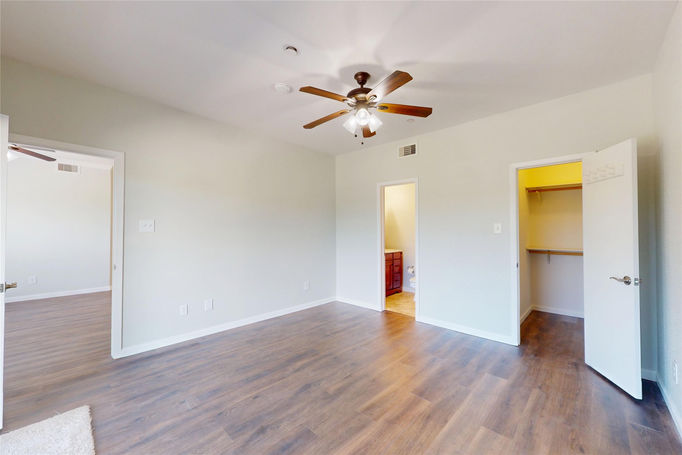 793 Davis Road, Unit 111 League City, TX 77573 - Photo 12 of 37 Walk-in closet and bathroom access from spacious primary bedroom.